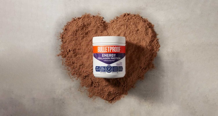 Bulletproof Dark Chocolate Energy Collagen Protein on top of a heart-shaped mound of protein powder.