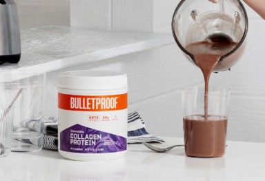 Bulletproof Chocolate Collagen Protein next to smoothie