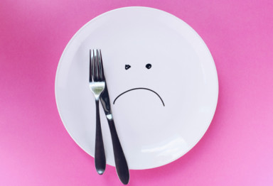 Sad face on white plate