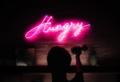 Person in front of the word