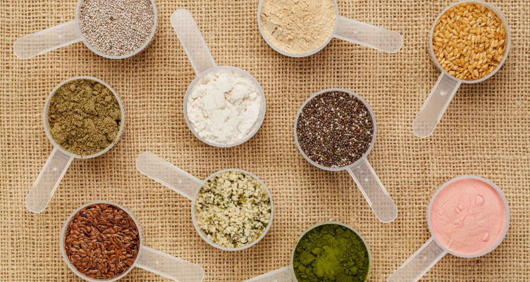 Overhead view of scoops filled with powder