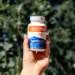 Holding a bottle of Bulletproof Magnesium