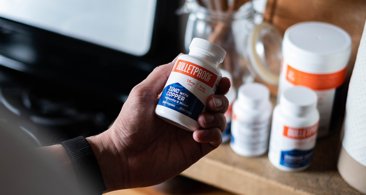 Man holding Bulletproof Zinc With Copper