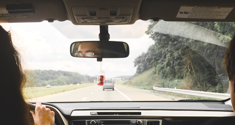 Woman driving on highway