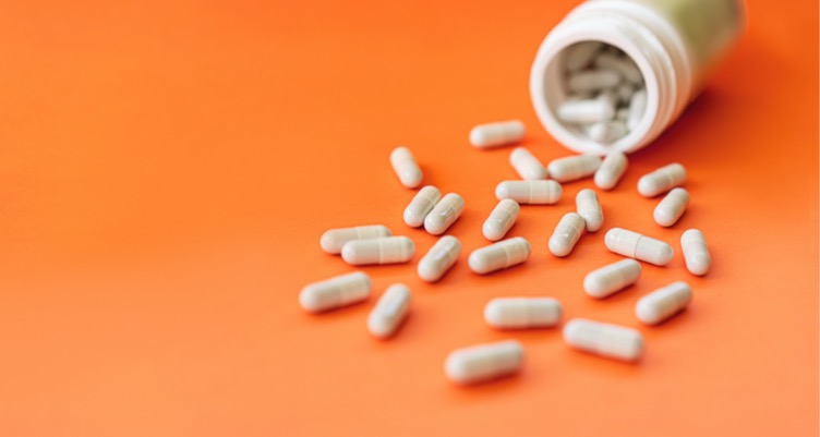 Zinc supplement on orange table