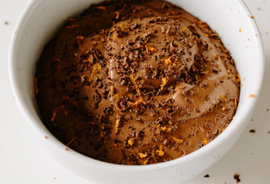 Chocolate collagen pudding in white bowl