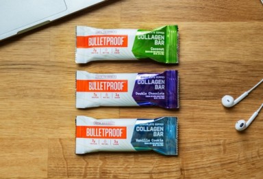 Three Bulletproof Chocolate Dipped Collagen Protein Bars on desk