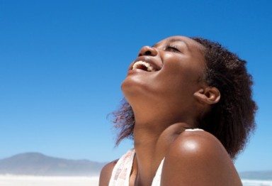 Smiling woman in desert sun