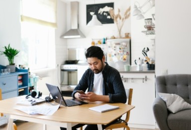 Man working at home at table