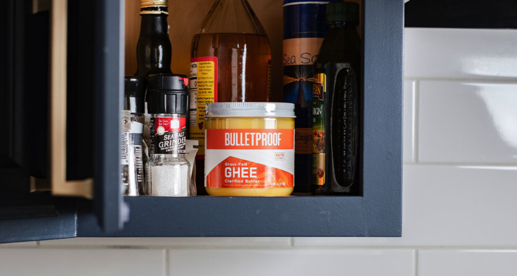 A jar of Bulletproof Grass-Fed Ghee in a kitchen pantry