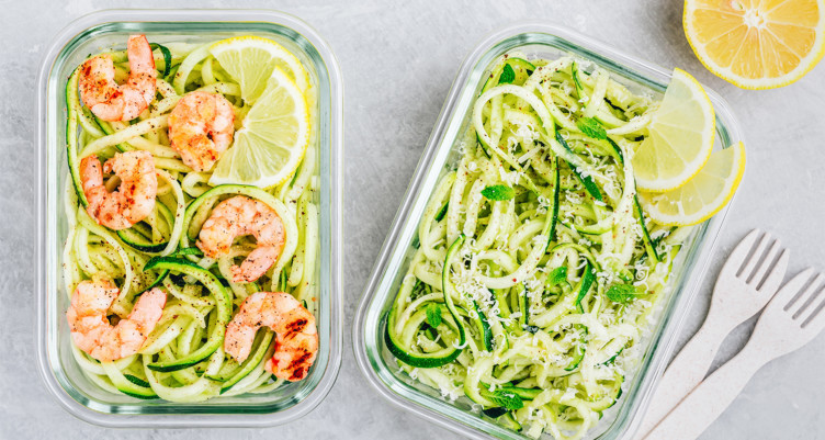An overhead shot of zucchini noodles and shrimp