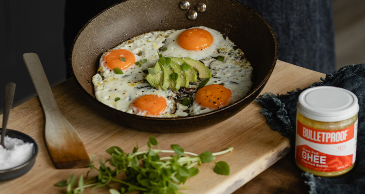 A cast iron skillet of eggs made with Bulletproof Grass-Fed Ghee