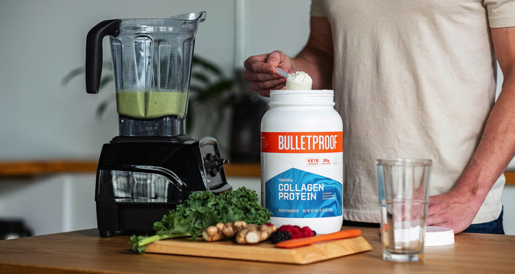 A person making a green smoothie with Bulletproof Vanilla Collagen Protein
