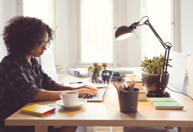 A woman working from her home office