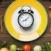 Alarm clock on plate