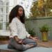 Woman meditating on yoga mat