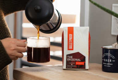 A woman pouring freshly brewed Bulletproof Original Coffee