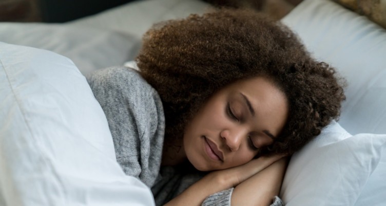 A black woman sleeping