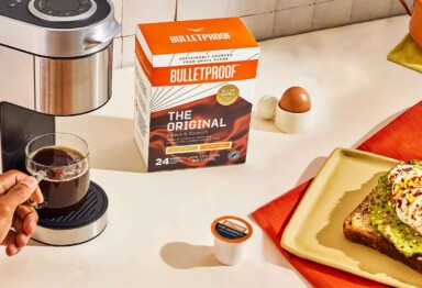 Bulletproof Coffee Pods brewing next to plate of avocado toast