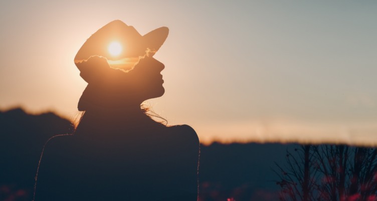 Silhouette of woman during sunset.