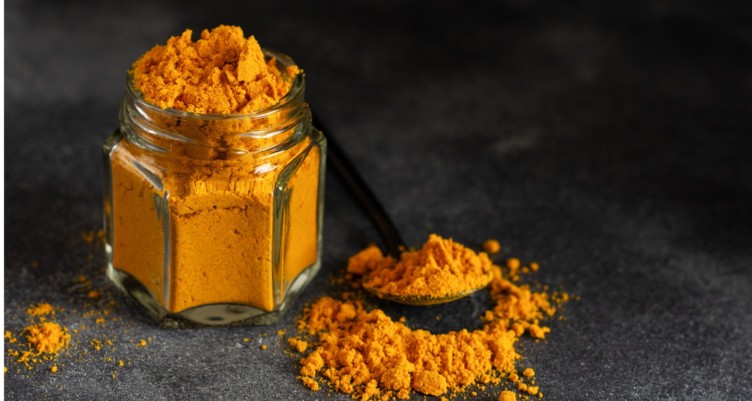 Turmeric in a bowl with spoon