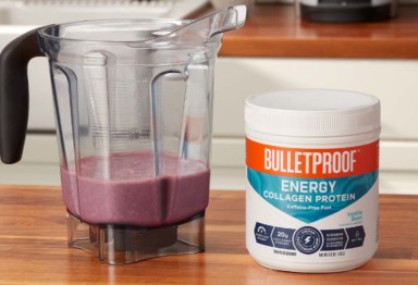 A tub of Bulletproof Complete Daily Energy Collagen Protein and smoothie ingredients