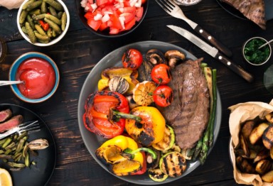 BBQ food with accompanying side dishes