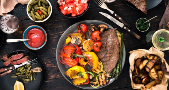 BBQ food with accompanying side dishes