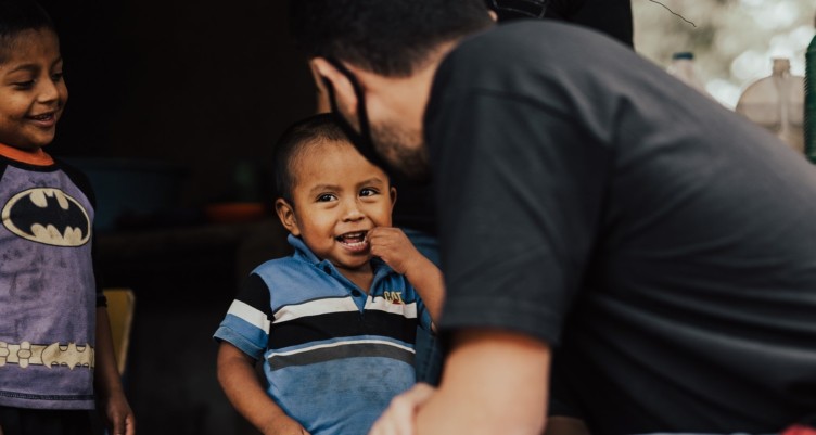 Man speaking to child