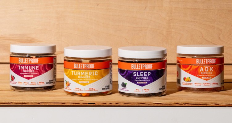 Four jars of Bulletproof Gummy Vitamins