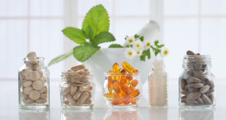 Jars of supplements on a table