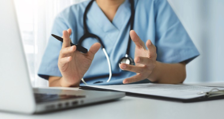 The silhouette of a doctor