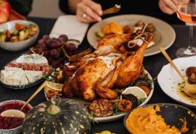 A Thanksgiving turkey and accompanying side dishes