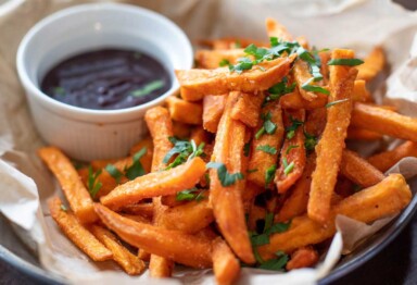 Paleo-friendly pumpkin spice sweet potato fries are a savory take on classic fall flavors -- especially paired with a rich chocolate dipping sauce.