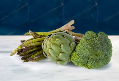 Green vegetables on a kitchen counter