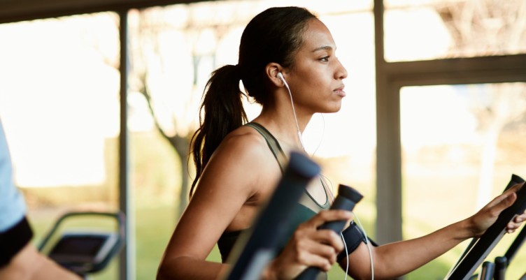 Woman on the elliptical machine.