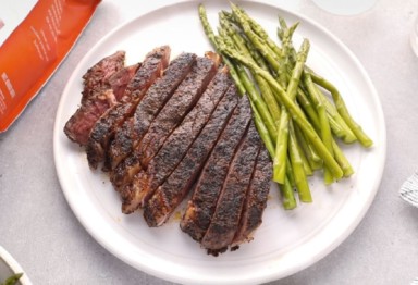 Sous vide coffee-rubbed steak with asparagus.