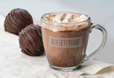 hot chocolate in a glass much next to chocolate bon bons