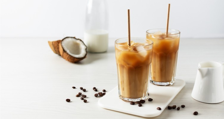 Iced coffee with coconut milk in tall glasses