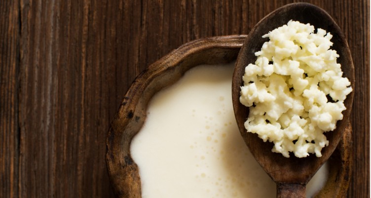 Bowl and spoon full of kefir