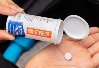 Bulletproof KetoPrime one lozenge in hand