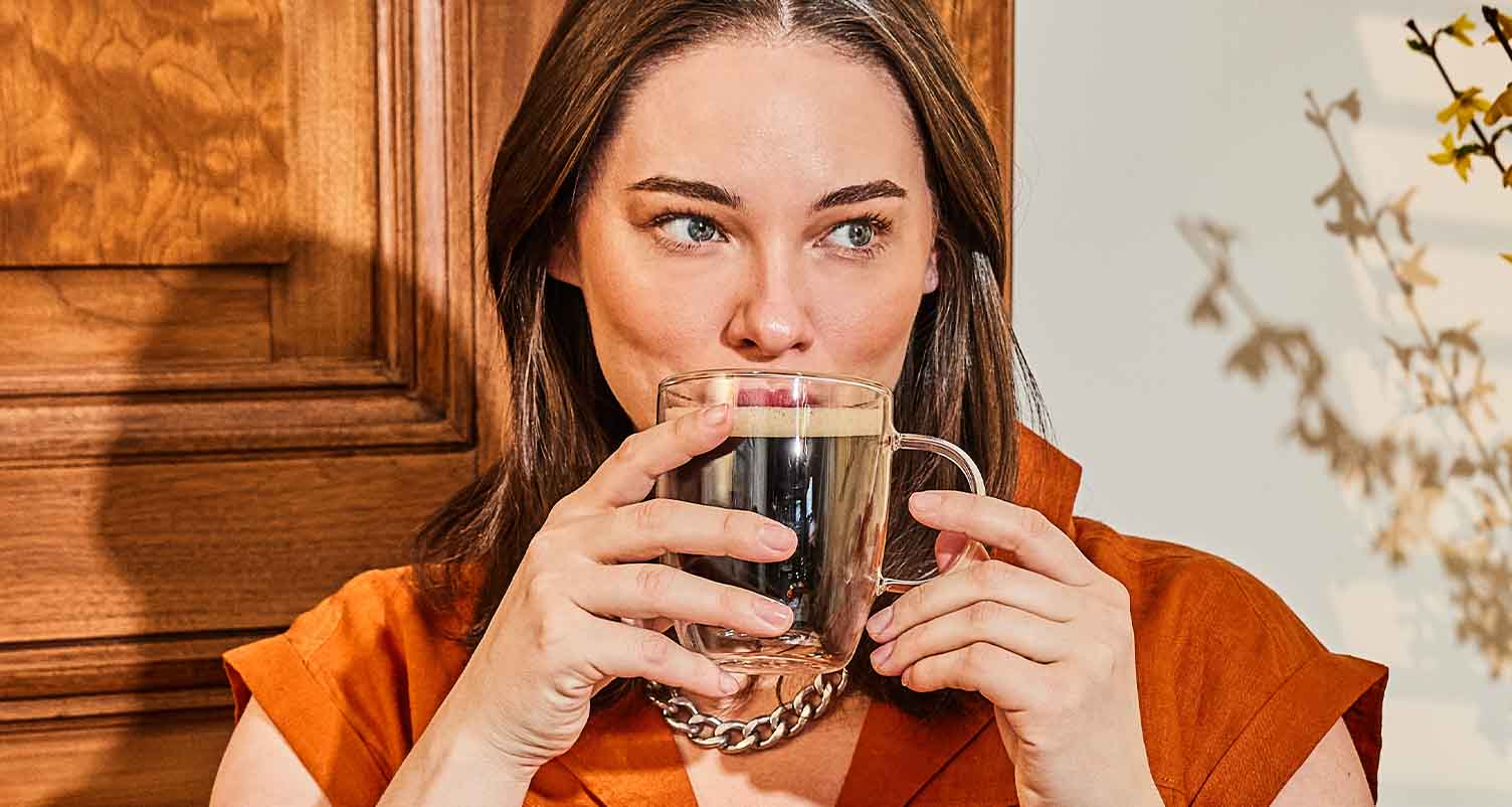 woman drinking collagen coffee