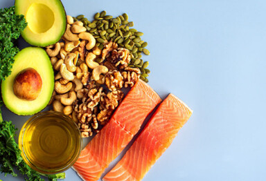 image with raw salmon, cashews, avocado, and other rich in magnesium