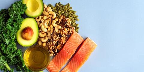 image with raw salmon, cashews, avocado, and other rich in magnesium