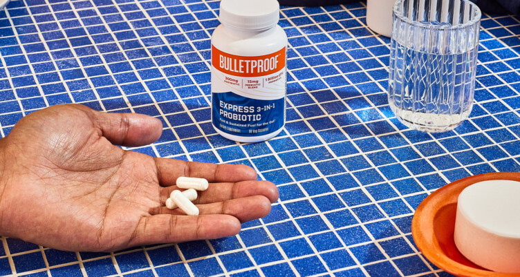 Serving size of Bulletproof Express 3-in-1 capsules in hand