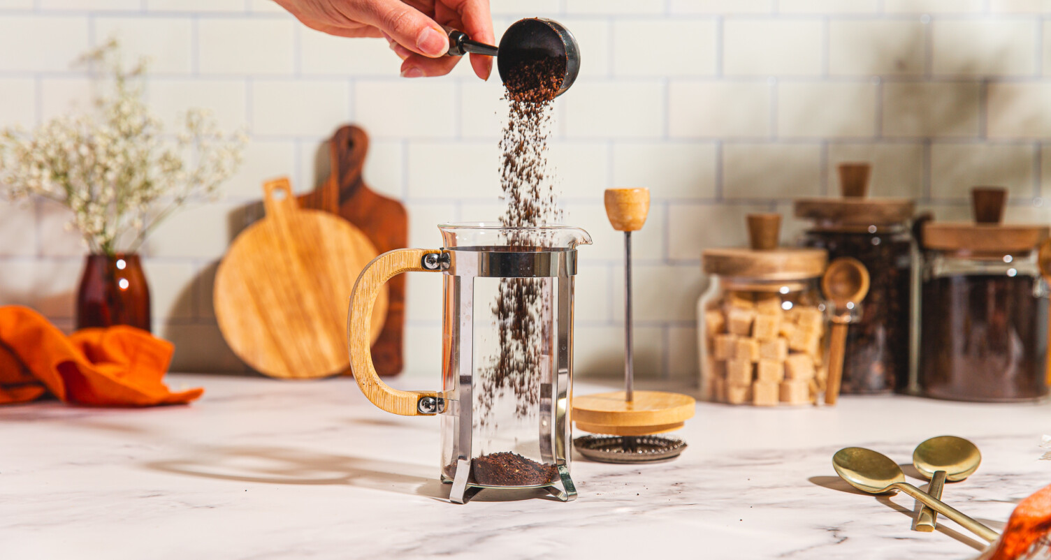 pouring coffee into a french press