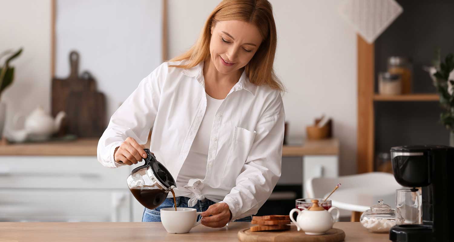 woman pouring coffee