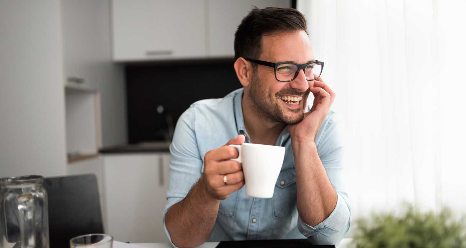 happy man drinking coffee