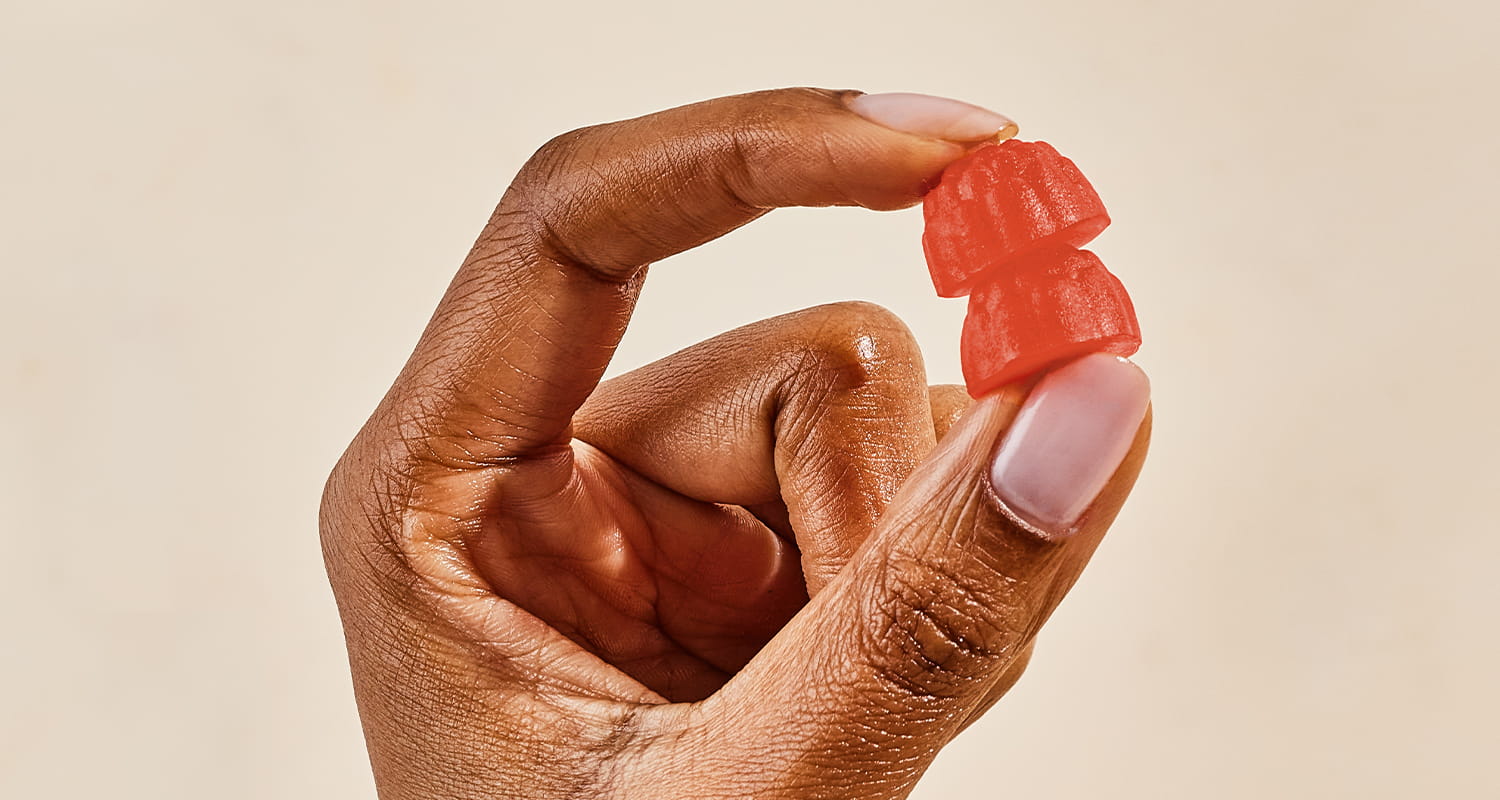 hand holding gummy vitamins