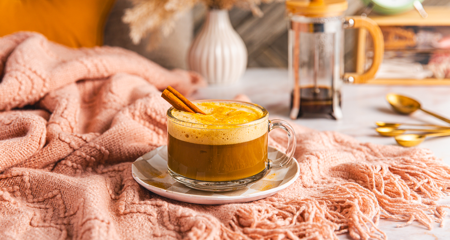 golden latte on a pink blanket